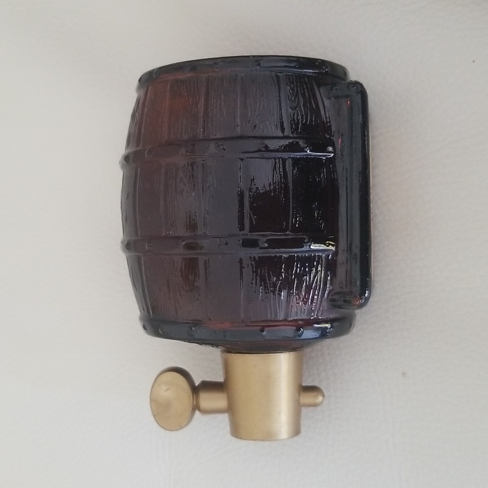Vintage Avon "Wild Country After Shave On Tap" bottle.